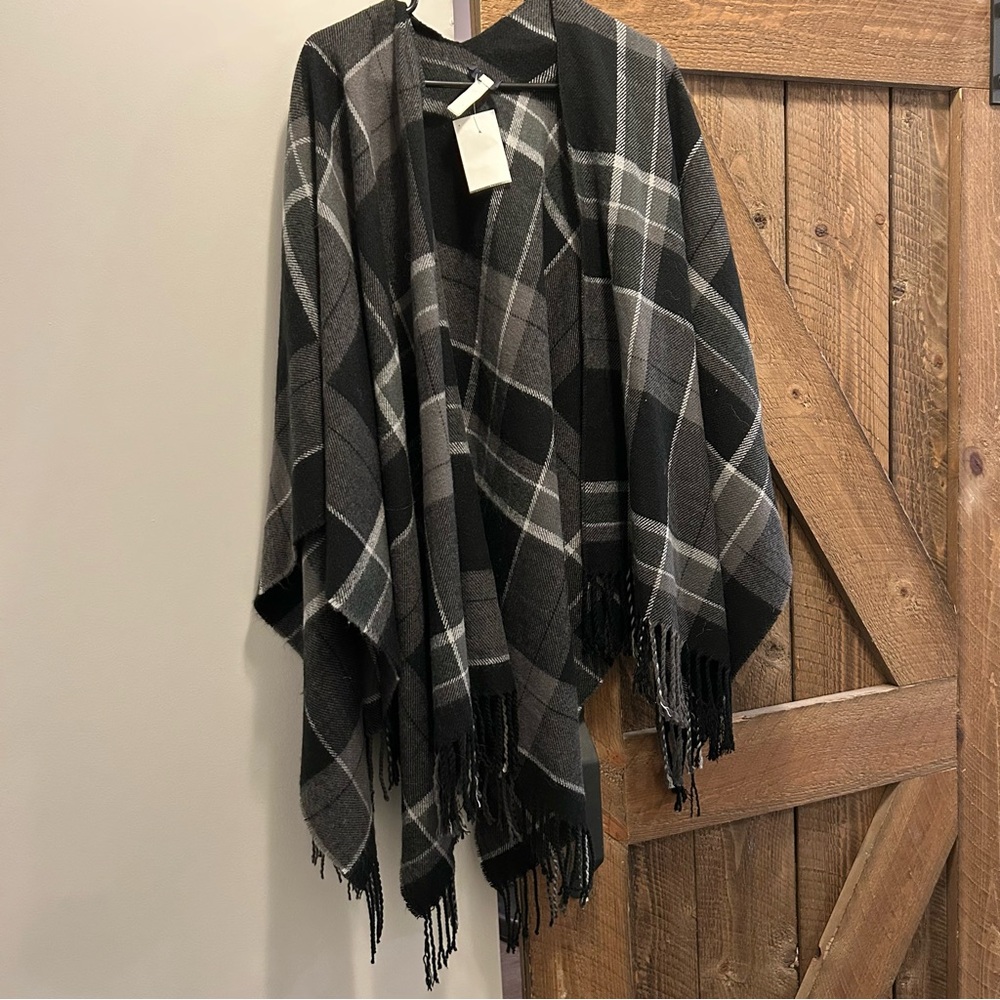 NWT. Black, Grey and White Plaid Fringe Poncho